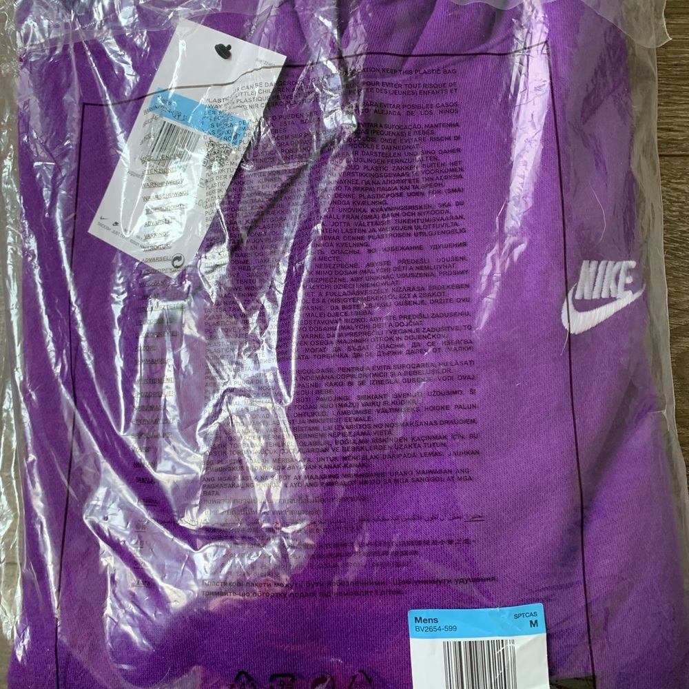 Men’s purple Nike hoodie size M